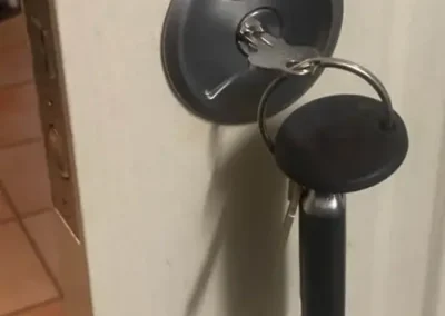 Exposed internal lock mechanism on a timber door edge