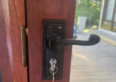 Damaged euro cylinder and lock hardware close view
