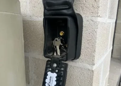 Silver door knob and deadbolt on a cream door