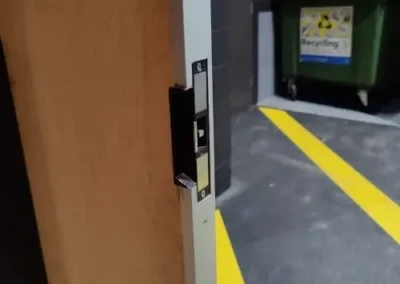 Electric strike installed in a commercial door frame