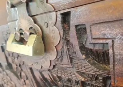 Padlock securing a decorative metal gate