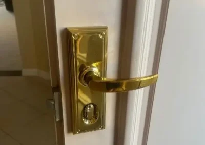 Brass lever handle fitted to an interior door