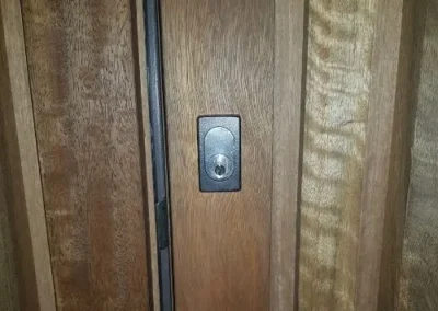 Lock cylinder fitted to a timber door