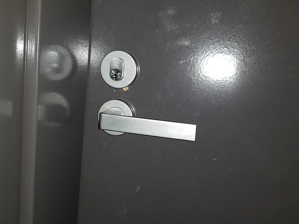 Close view of door lock and latch hardware for Banksia Beach locksmith services