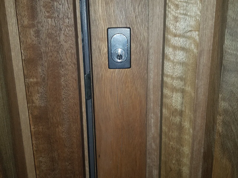 Close view of door lock and latch hardware for Boondall locksmith services