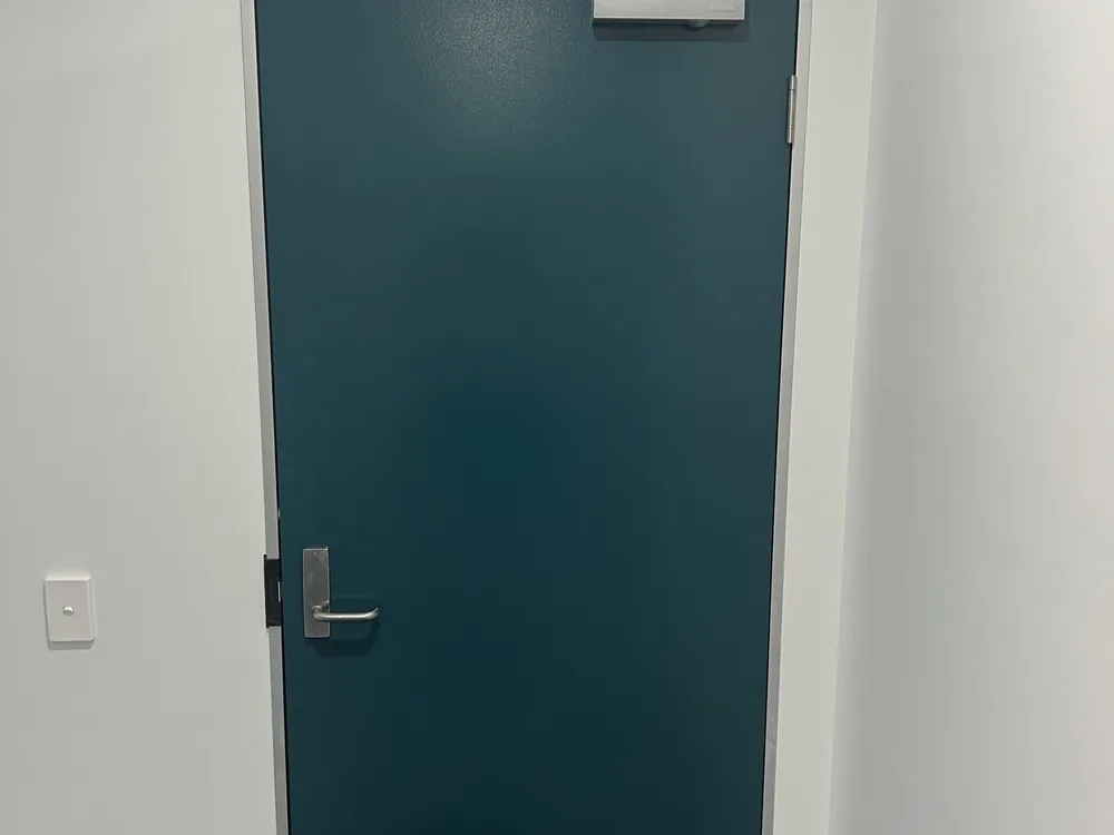 Close view of door lock and latch hardware for Carseldine locksmith services