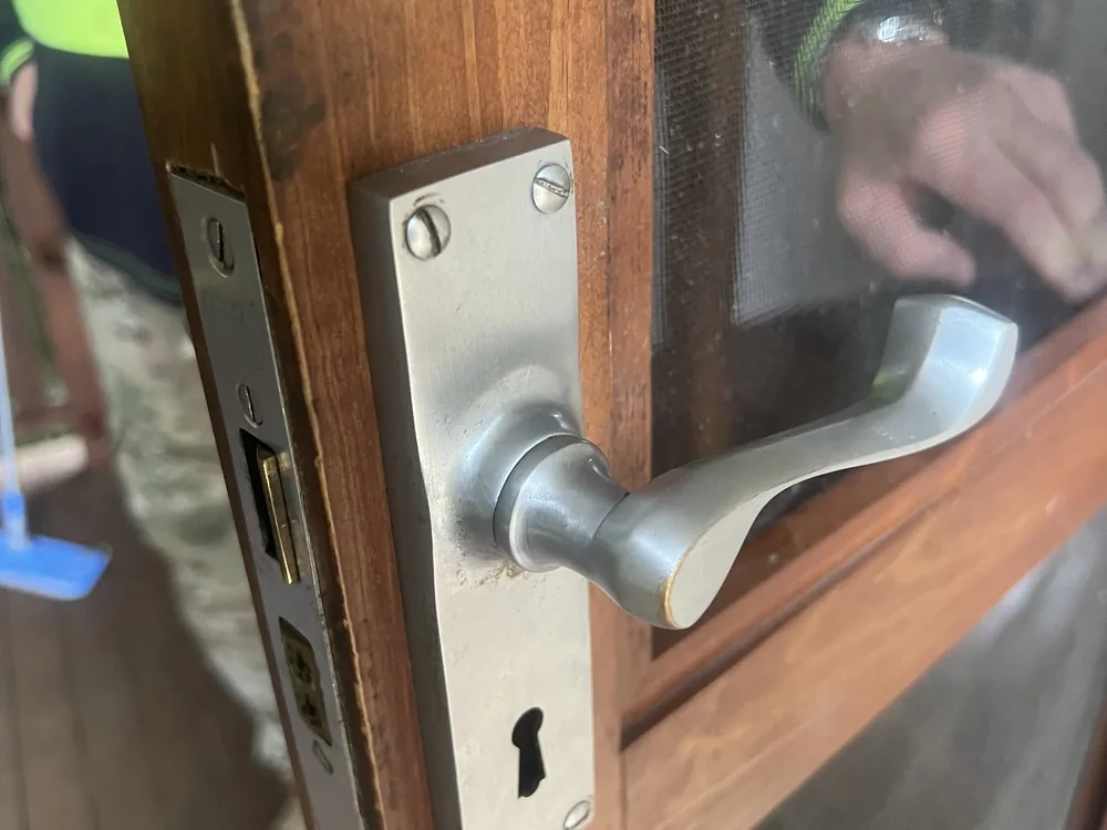 Close view of door lock and latch hardware for Cashmere locksmith services