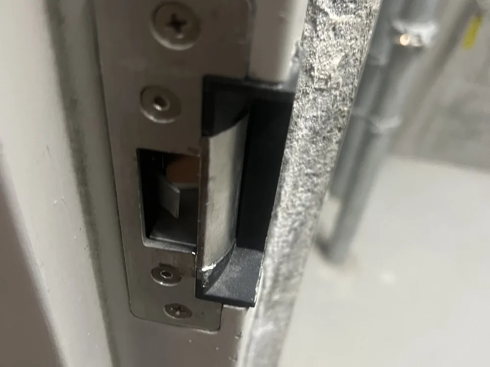 Close view of door lock and latch hardware for Chapel Hill locksmith services