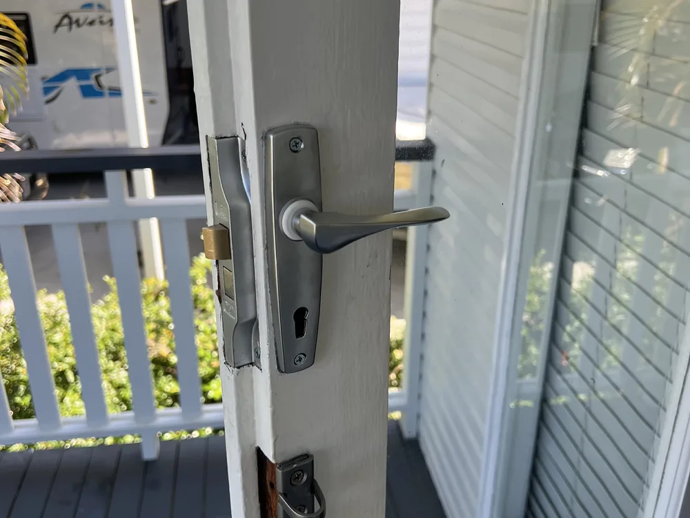 Close view of door lock and latch hardware for Eagle Farm locksmith services