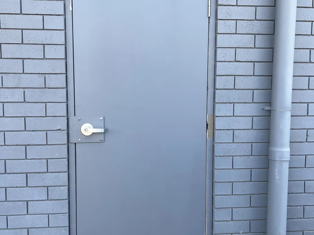 Close view of door lock and latch hardware for Fitzgibbon locksmith services
