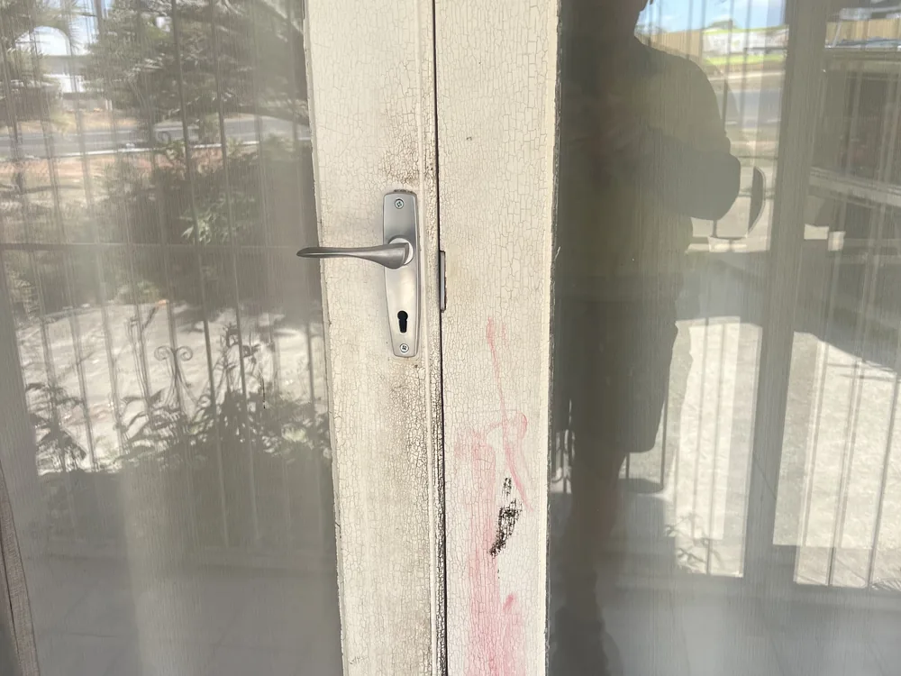 Close view of door lock and latch hardware for Hendra locksmith services