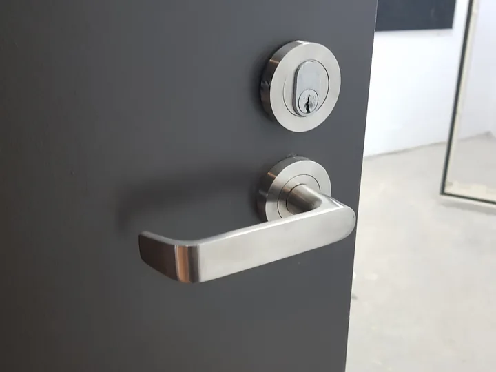 Close view of fitted door lock hardware