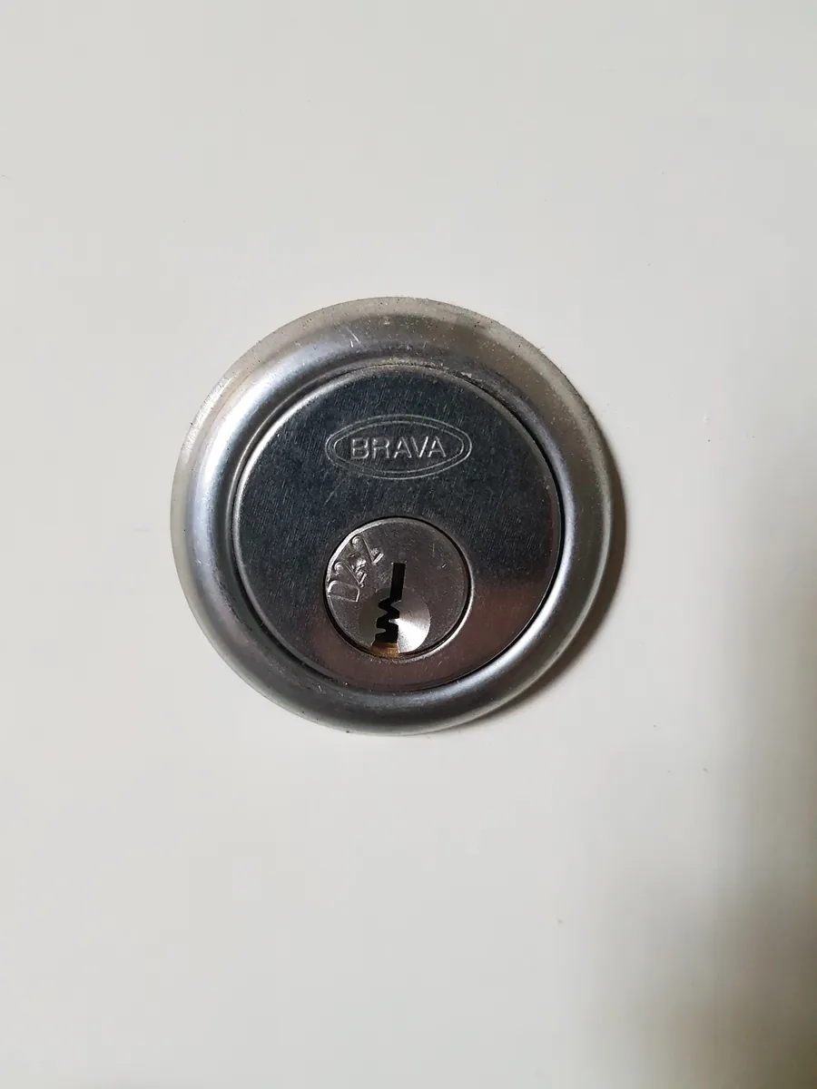 Installed door handle and locking hardware