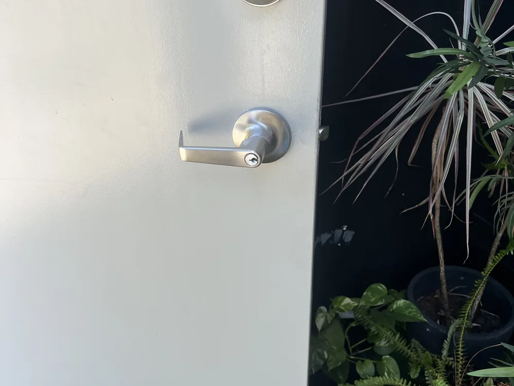 Close view of door lock and latch hardware for Zillmere locksmith services